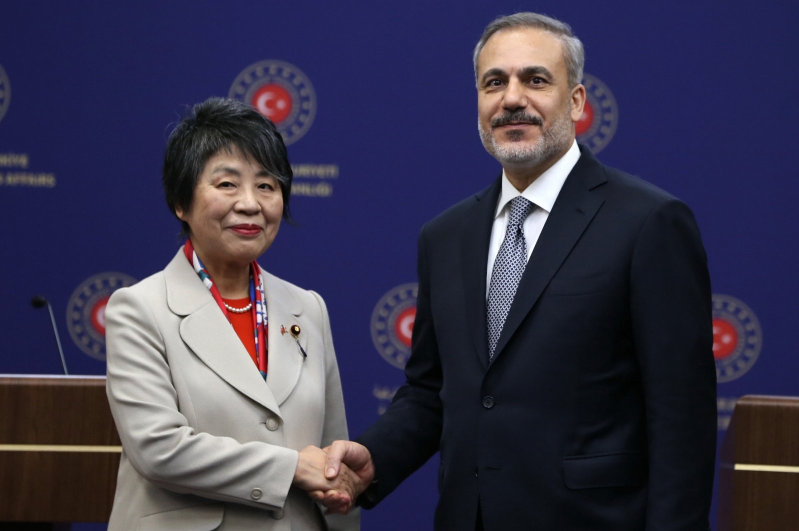 Foreign Minister Hakan Fidan (R) and Japanese Foreign Minister Yoko Kamikawa (L) shake hands during a news conference after their meeting in Ankara, Turkey, Jan. 16, 2024. (EPA Photo)
