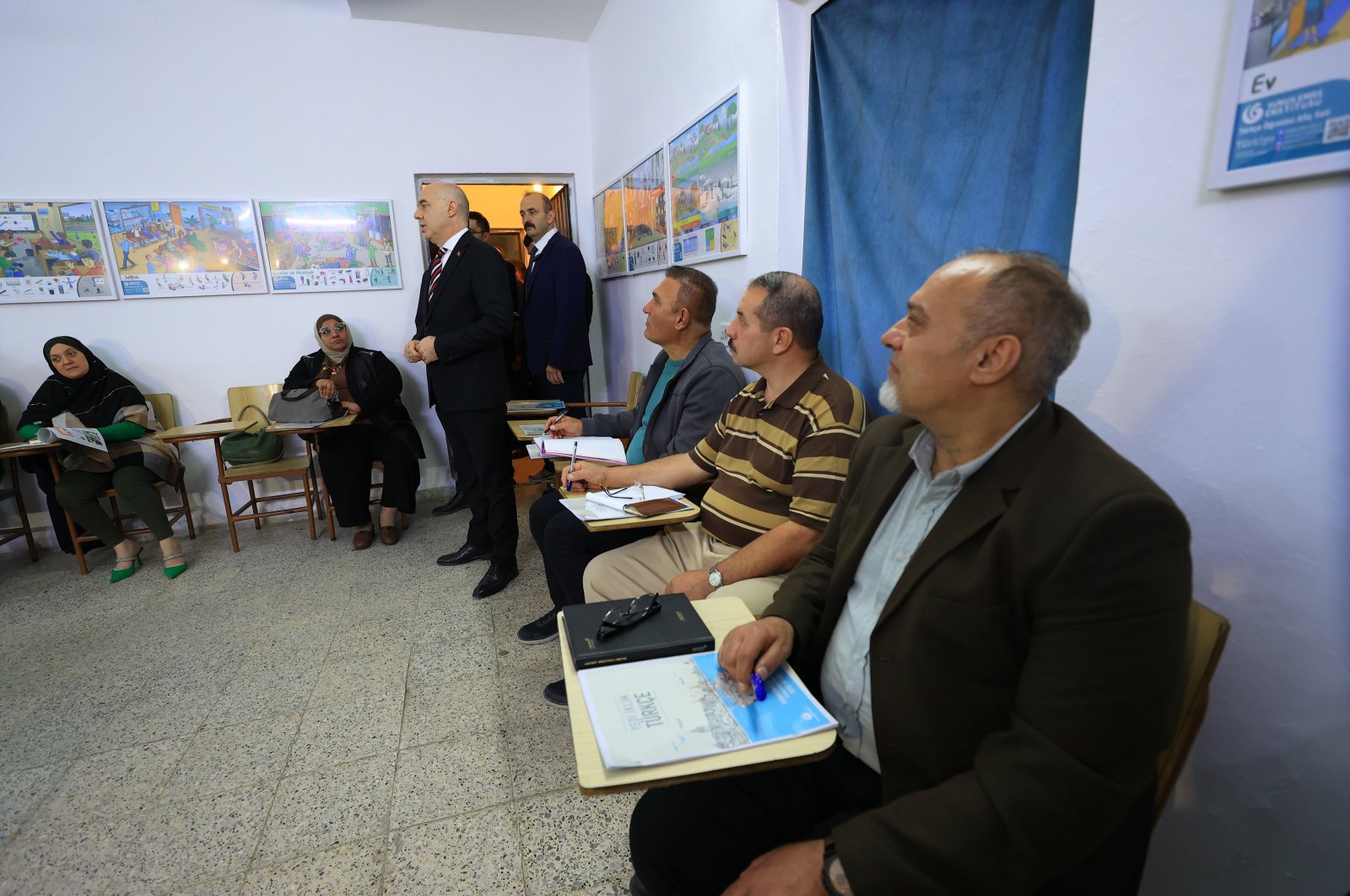 Türkiye&#039;s Ambassador to Iraq Ali Rıza Güney attends the first class for the Turkish language course opened by the Yunus Emre Institute (YEE) in Baghdad, Iraq, Jan. 16, 2024. (AA Photo)