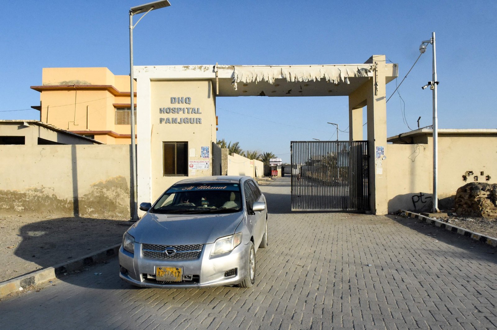 A car leaves the district headquarters hospital (DHQ) in Panjgur town of Balochistan province on Jan. 17, 2024. (AFP Photo)
