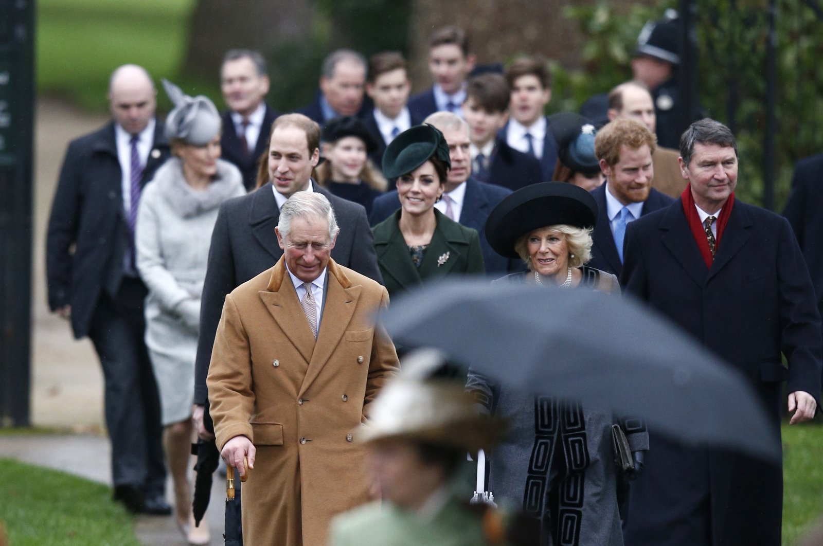 Britain&#039;s Prince Charles and his wife Camilla arrive ahead of Prince William and Kate, and other members of the royal family, to attend the Christmas Day service at church in Sandringham, eastern England, Dec. 25, 2015. (Reuters File Photo)