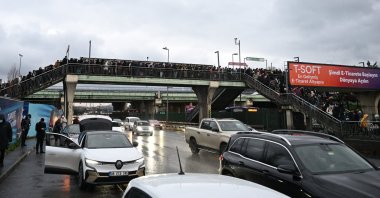 People try to enter a crowded metrobus stop, Istanbul, Türkiye, Jan. 10, 2024. (AA Photo)