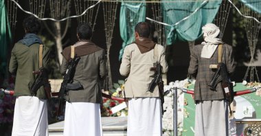 Armed Houthi rebels visit a shrine of slain Houthi fighters, in Sana'a, Yemen, Jan. 17, 2024. (EPA Photo)