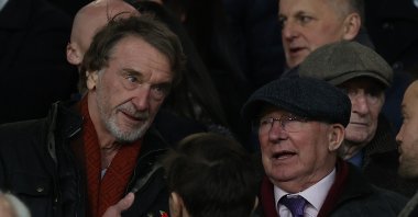 Sir Jim Ratcliffe (L) talks to Sir Alex Ferguson in the directors' box ahead of the Premier League match between Manchester United and Tottenham Hotspur at Old Trafford, Manchester, U.K., Jan. 14, 2024. (Getty Images Photo)