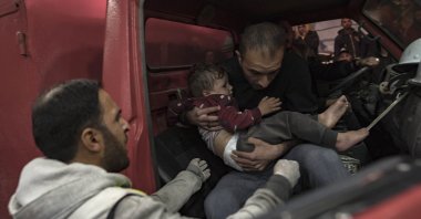 An injured child is brought to Nasser Hospital in Khan Younis, southern Gaza Strip, Palestine, Jan. 16, 2024. (EPA Photo)