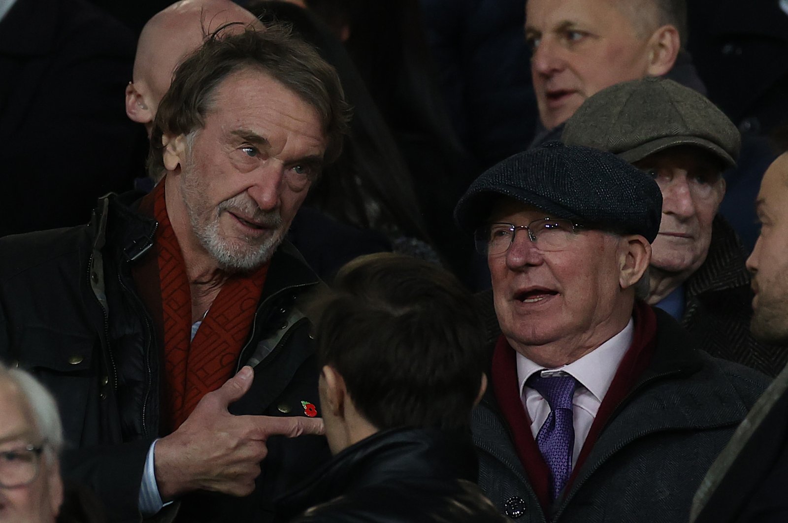 Sir Jim Ratcliffe (L) talks to Sir Alex Ferguson in the directors&#039; box ahead of the Premier League match between Manchester United and Tottenham Hotspur at Old Trafford, Manchester, U.K., Jan. 14, 2024. (Getty Images Photo)