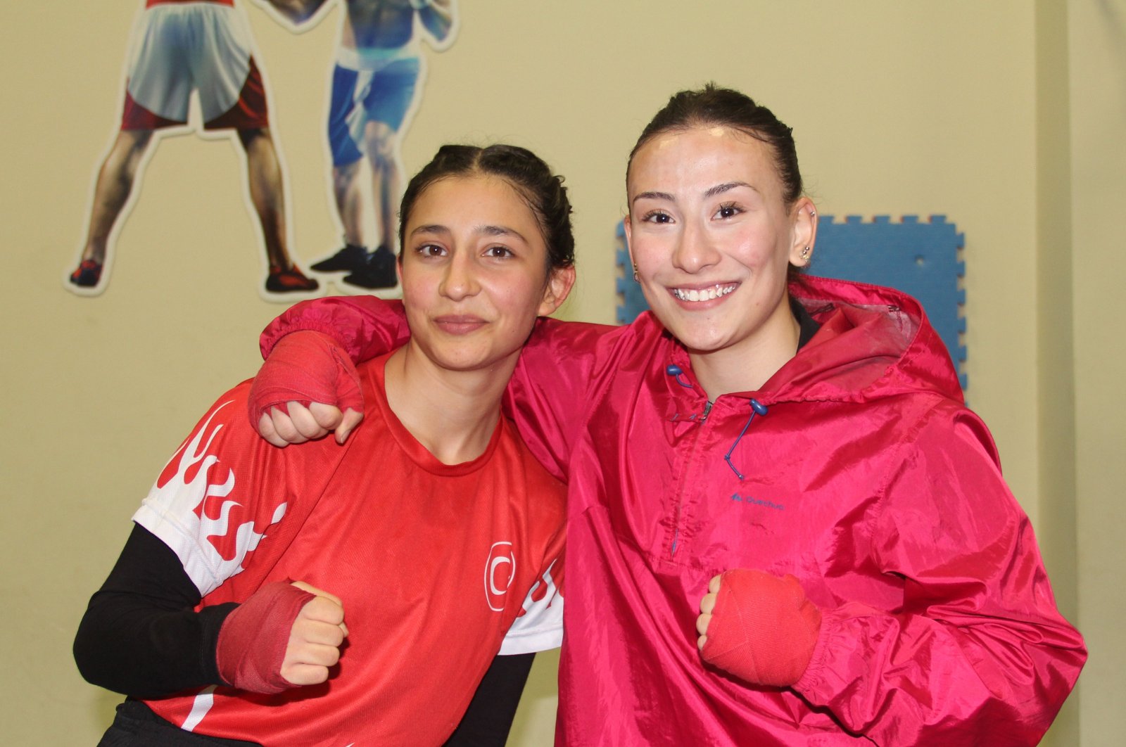Turkish boxers Eda Nur Ilhan (L) and Eda Nur Kılıççı pose for a photo after a training session, Kırıkkale, Türkiye, Jan. 18, 2024. (AA Photo)