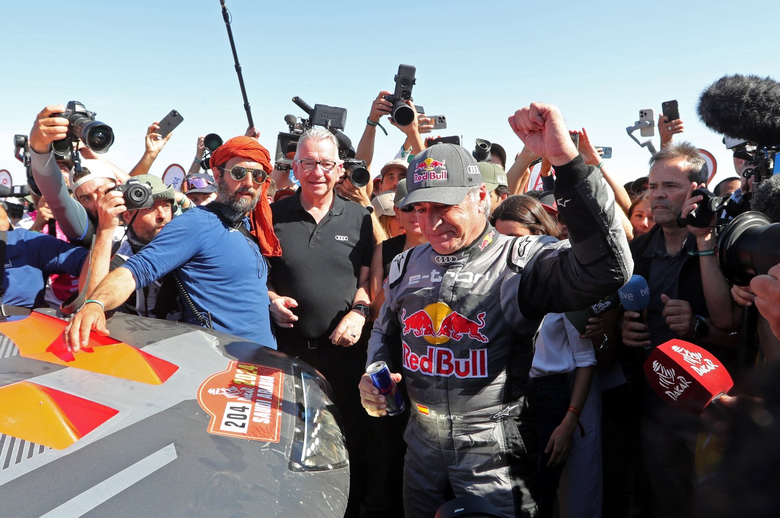 Team Audi Sport&#039;s Carlos Sainz Sr. celebrates after winning the Dakar Rally car category, Yanbu, Saudi Arabia, Jan. 19, 2024. (Reuters Photo)