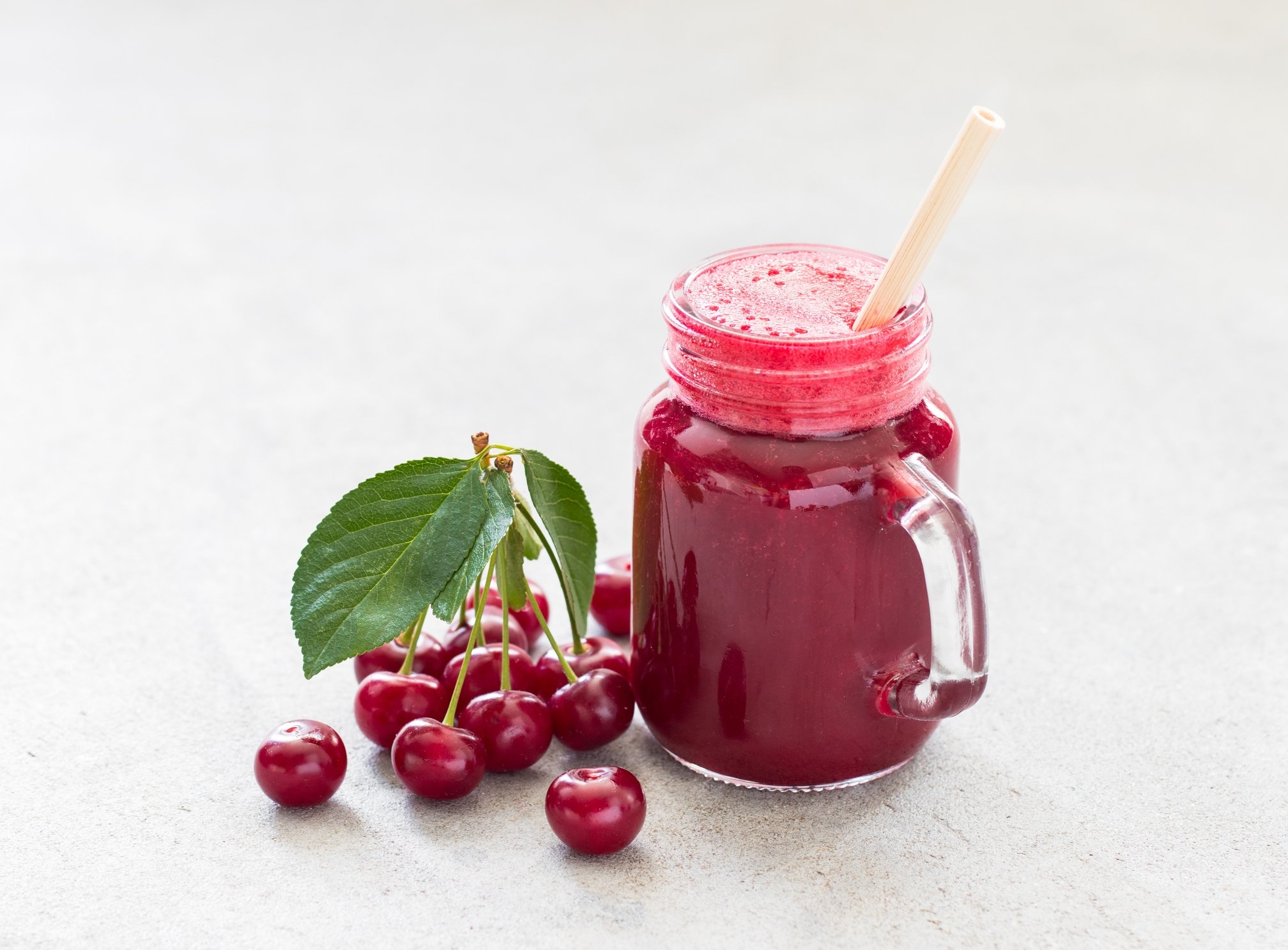 Cherry smoothie in a glass jar. (Getty Images Photo)