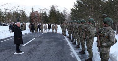 Defense Minister Yaşar Güler (L) greets commandos taking part in operations against the PKK terrorist group, Hakkari, southeastern Türkiye, Dec. 25, 2023. (AA Photo)