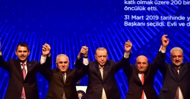 President Recep Tayyip Erdoğan (C) poses with Istanbul district candidates of the Justice and Development Party (AK Party) at an event, Istanbul, Türkiye, Jan. 20, 2024. (İHA Photo)