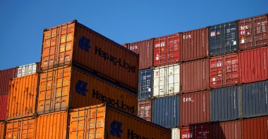 Piled up containers at the harbor in Hamburg, Germany, July 19, 2022. (Reuters Photo)