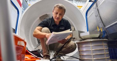 An unlocated handout picture shows Türkiye&#039;s first astronaut  Alper Gezeravci at work during the preparation of the third Axiom mission, Aug. 8, 2023. (AFP Photo)