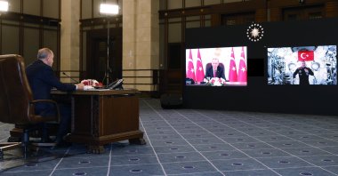 President Recep Tayyip Erdoğan speaks with Türkiye's first astronaut Alper Gezeravcı in a video call, Ankara, Türkiye, Jan. 22, 2024. (AA Photo)