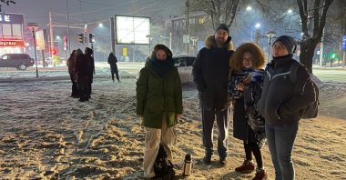 People gather in a street as they left their flats in apartment buildings after the earthquake in Almaty, Kazakhstan, Monday, Jan. 22, 2024. (AP Photo)