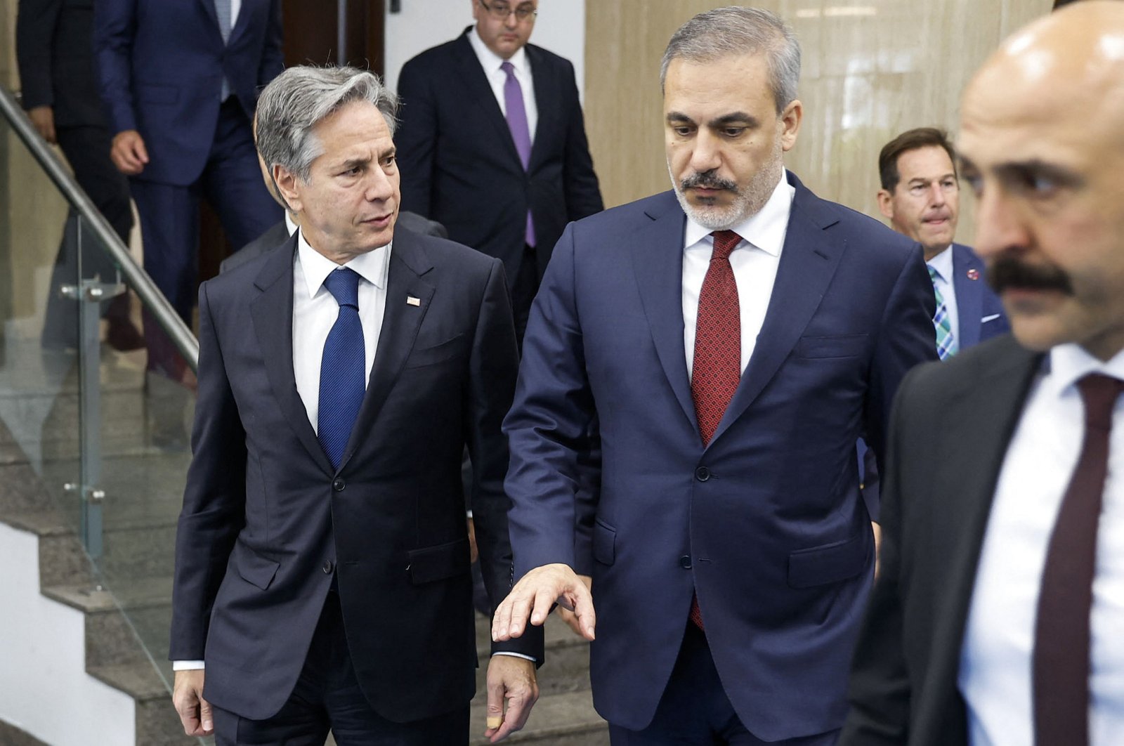 U.S. Secretary of State Antony Blinken (L) walks with Foreign Minister Hakan Fidan (C) after a meeting at the Ministry of Foreign Affairs, Ankara, Türkiye, Nov. 6, 2023. (AFP Photo)