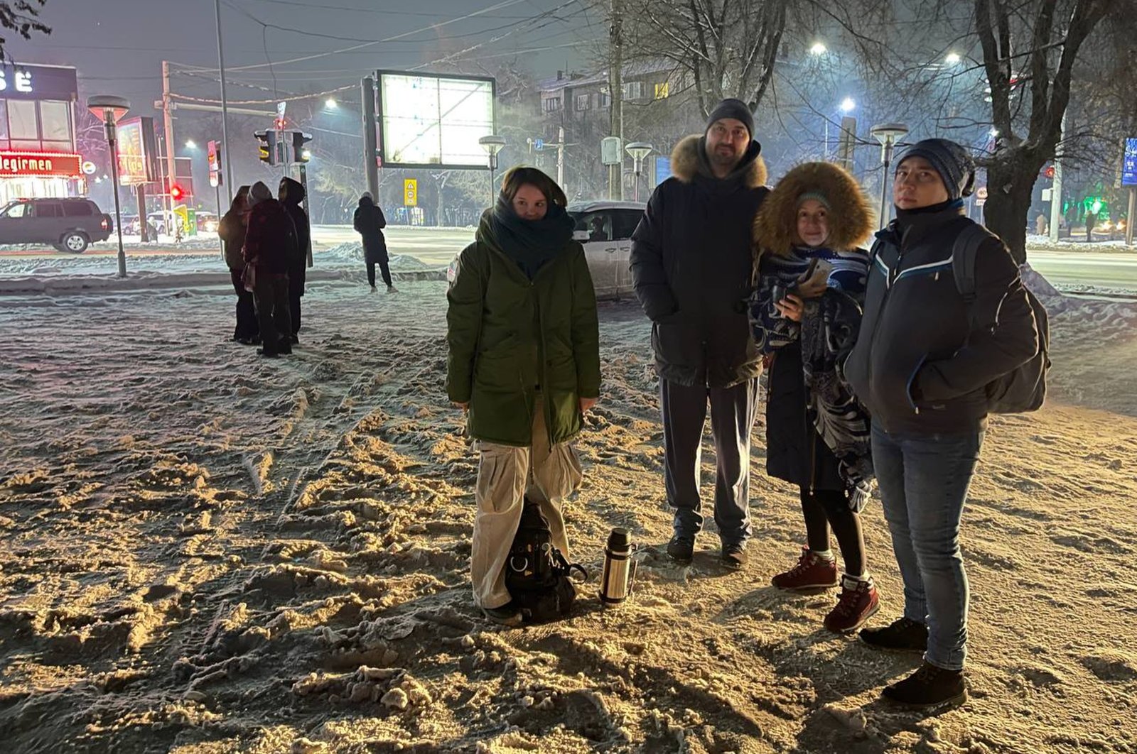 People gather in a street as they left their flats in apartment buildings after the earthquake in Almaty, Kazakhstan, Monday, Jan. 22, 2024. (AP Photo)