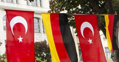The flags of Germany and Türkiye hanging outside on a street in Kreuzberg, Berlin, Germany. (Getty Images)
