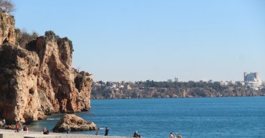 People are seen enjoying at Antalya Beach, Türkiye, Jan. 22, 2024. (IHA Photo)