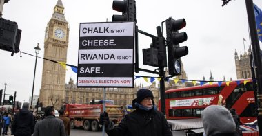 Protesters display placards against the U.K. government's plan to send some asylum-seekers to Rwanda, London, U.K., Jan. 17, 2024. (EPA Photo)