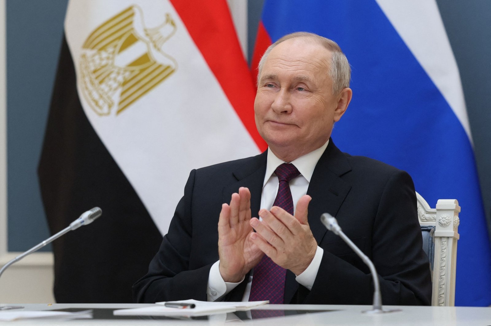 President Vladimir Putin takes part in a ceremony pouring the first portion of concrete for power unit 4 at Egypt&#039;s first nuclear power station in el-Dabaa, on the Mediterranean coast, via a video link in Moscow, Russia, on Jan. 23, 2024. (AFP Photo)