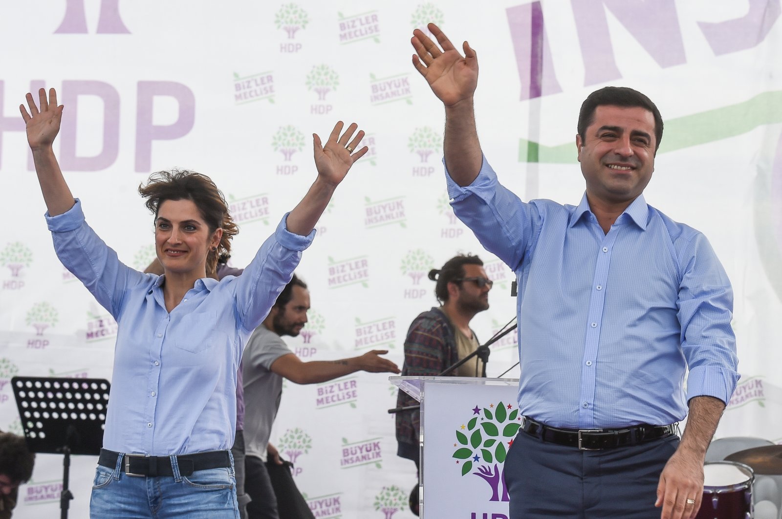 Selahattin Demirtaş (R), former co-chair of the pro-PKK People&#039;s Democratic Party (HDP) and his wife Başak Demirtaş (L) salute their supporters during a rally, May 30, 2015, in Istanbul, Türkiye. (Getty Images Photo)