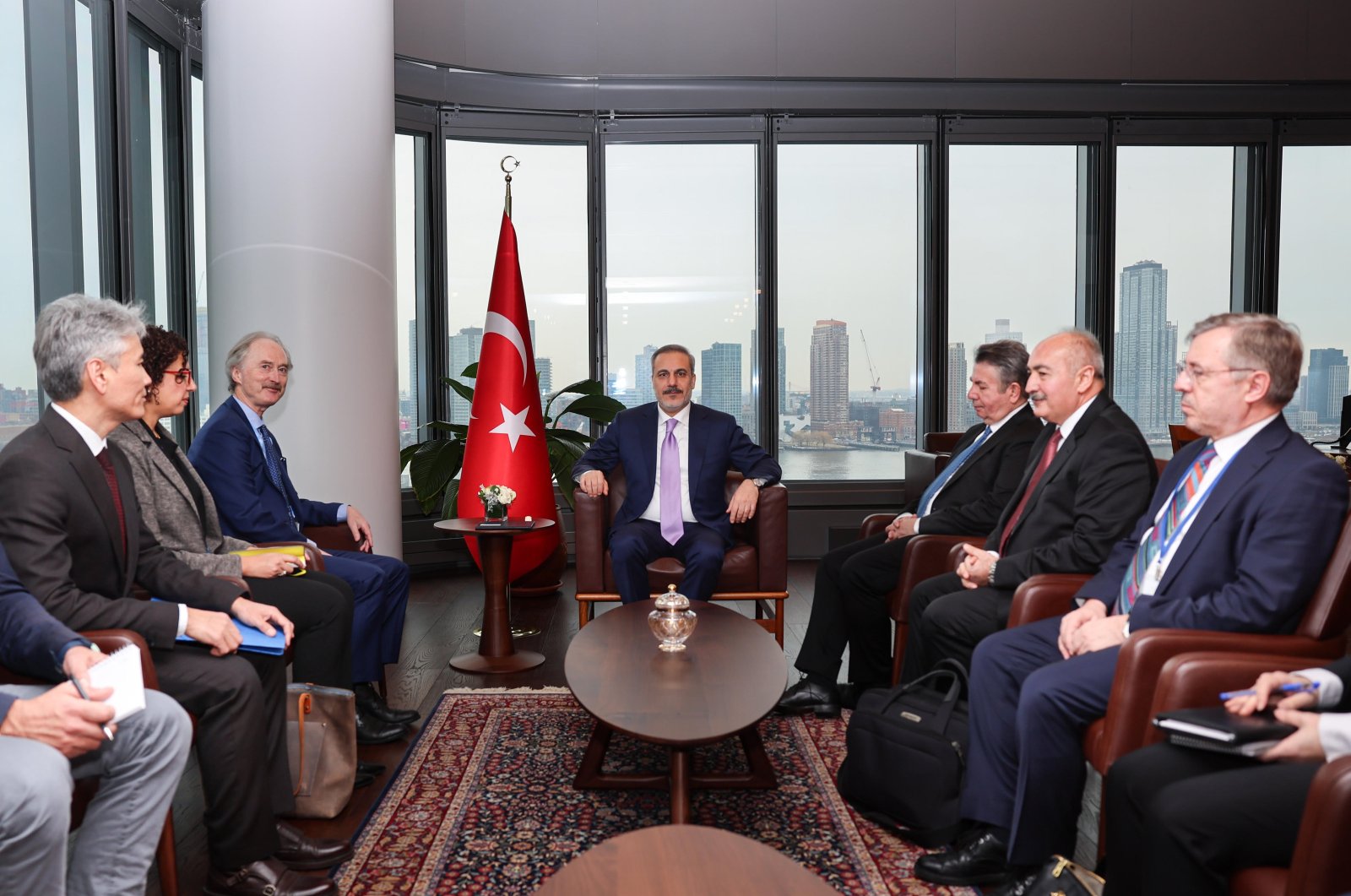 Foreign Minister Hakan Fidan (center) holds a meeting with special envoy for Syria Geir Pedersen and his delegation at the Turkish House (Türkevi) in New York, Jan. 23, 2024. (AA Photo)