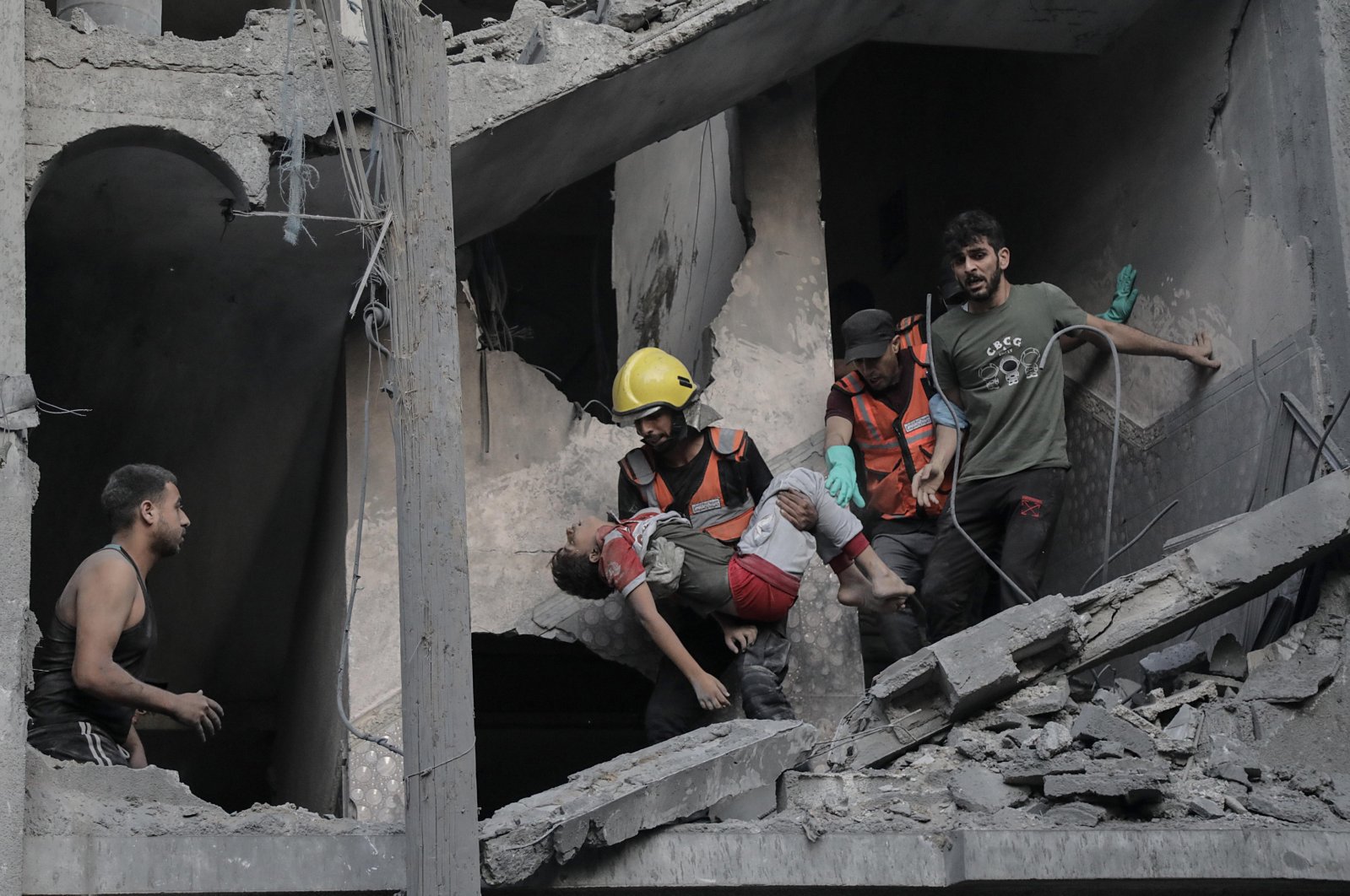 A child is recovered from the rubble of a residential building leveled in an Israeli airstrike, in Khan Younis refugee camp in the southern Gaza Strip, Oct. 19, 2023. (EPA File Photo)