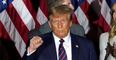 Republican presidential hopeful and former U.S. President Donald Trump gestures during an Election Night Party in Nashua, New Hampshire, Jan. 23, 2024. (AFP Photo)