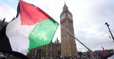 Protesters stage a sit-in on Westminster Bridge during a march in support of Palestine, London, Britain, Jan. 6, 2024. (EPA Photo)