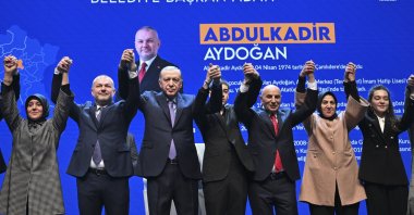 President Recep Tayyip Erdoğan (3rd-L) greets the crowd with district mayor candidates for the upcoming local elections at a ceremony in the capital Ankara, Türkiye, Jan. 24, 2024. (AA Photo)
