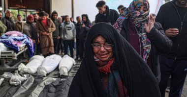 Palestinians wait at a hospital to collect the bodies of their relatives killed in Israeli bombardment, Rafah, southern Gaza Strip, Palestine, Jan. 24, 2024. (AFP Photo)