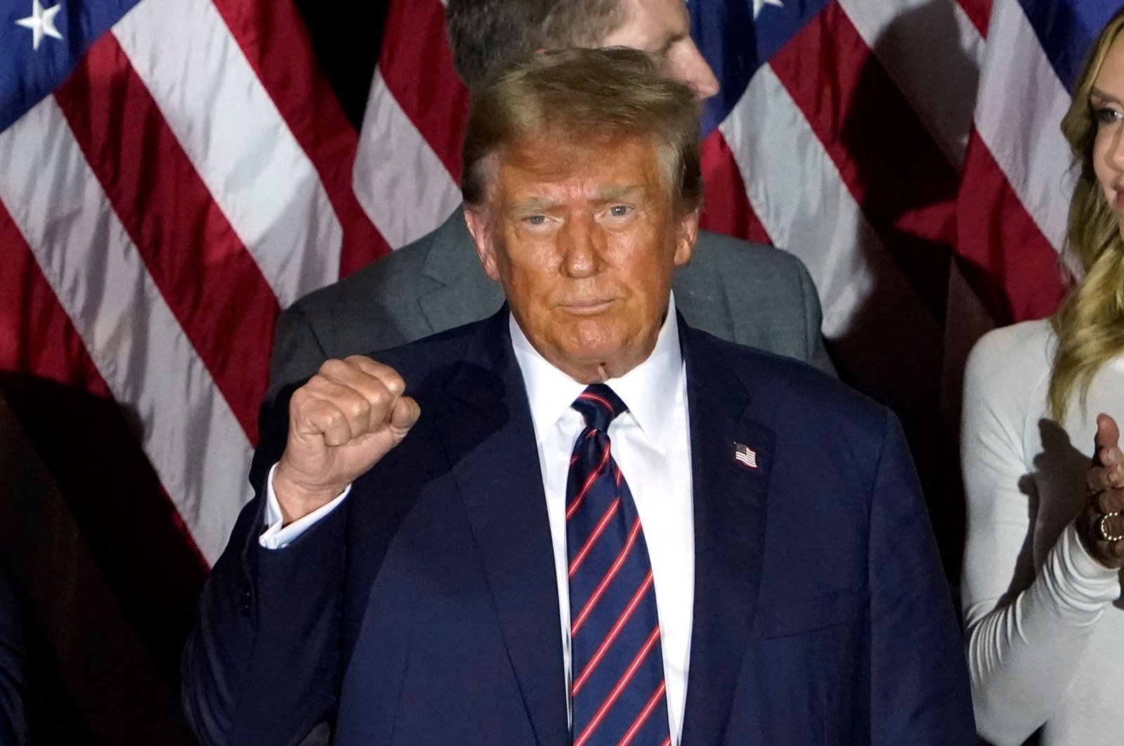 Republican presidential hopeful and former U.S. President Donald Trump gestures during an Election Night Party in Nashua, New Hampshire, Jan. 23, 2024. (AFP Photo)