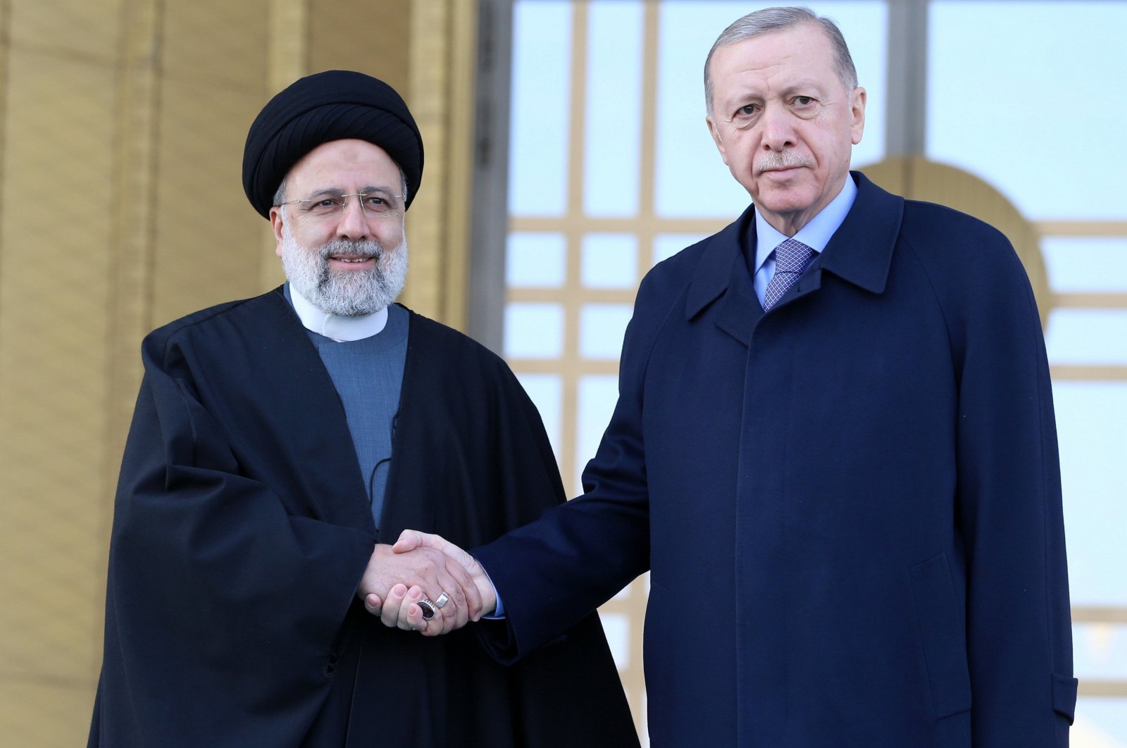 President Recep Tayyip Erdogan (R) and Iranian President Ebrahim Raisi (L) pose for a photo during a welcome ceremony at the presidential palace in the capital Ankara, Türkiye, Jan. 24, 2024. (EPA Photo)