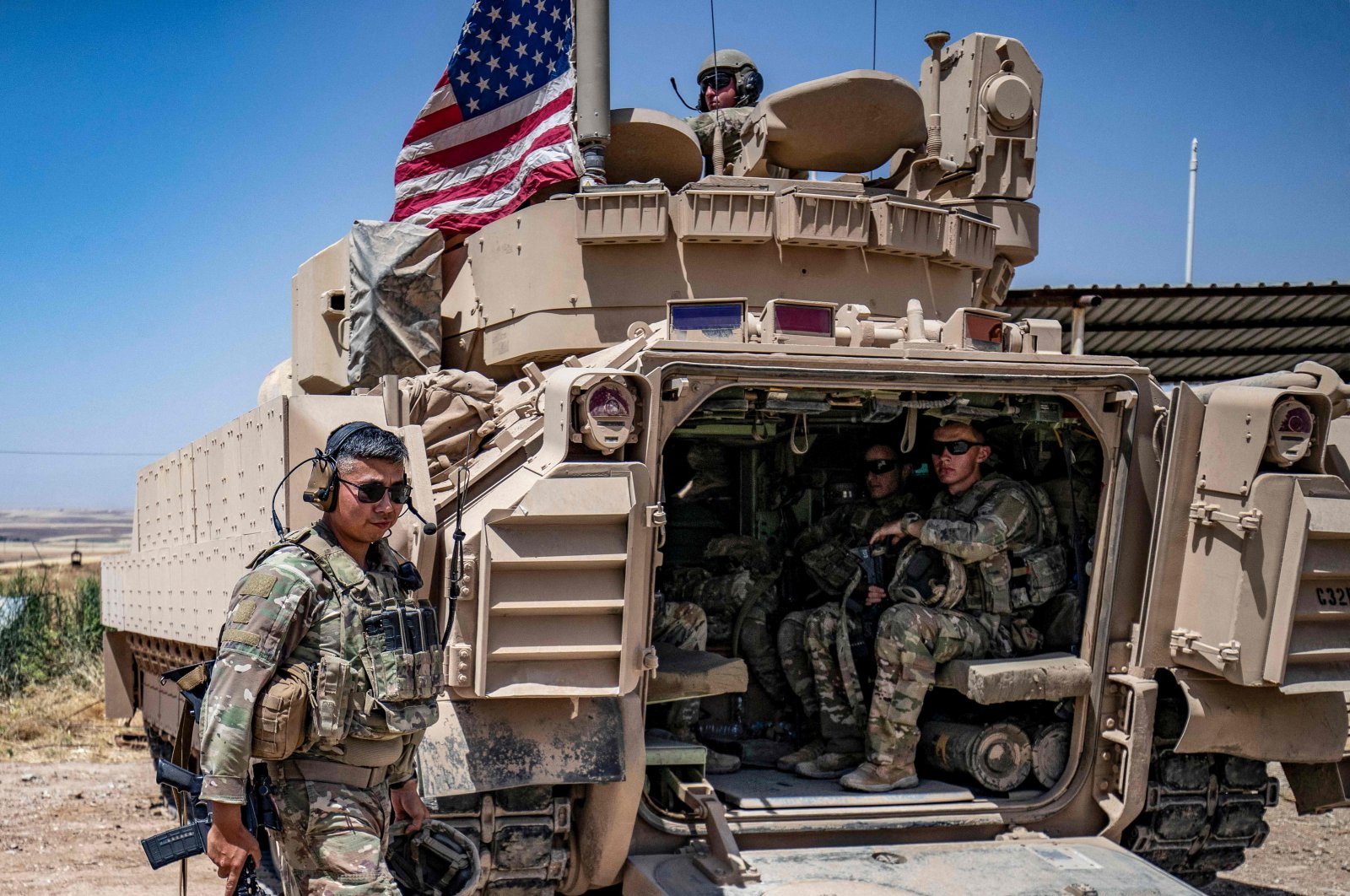 U.S. soldiers patrol the countryside of Rumaylan (Rmeilan) in northeastern Hassakeh province, Syria, June 7, 2023. (AFP Photo)