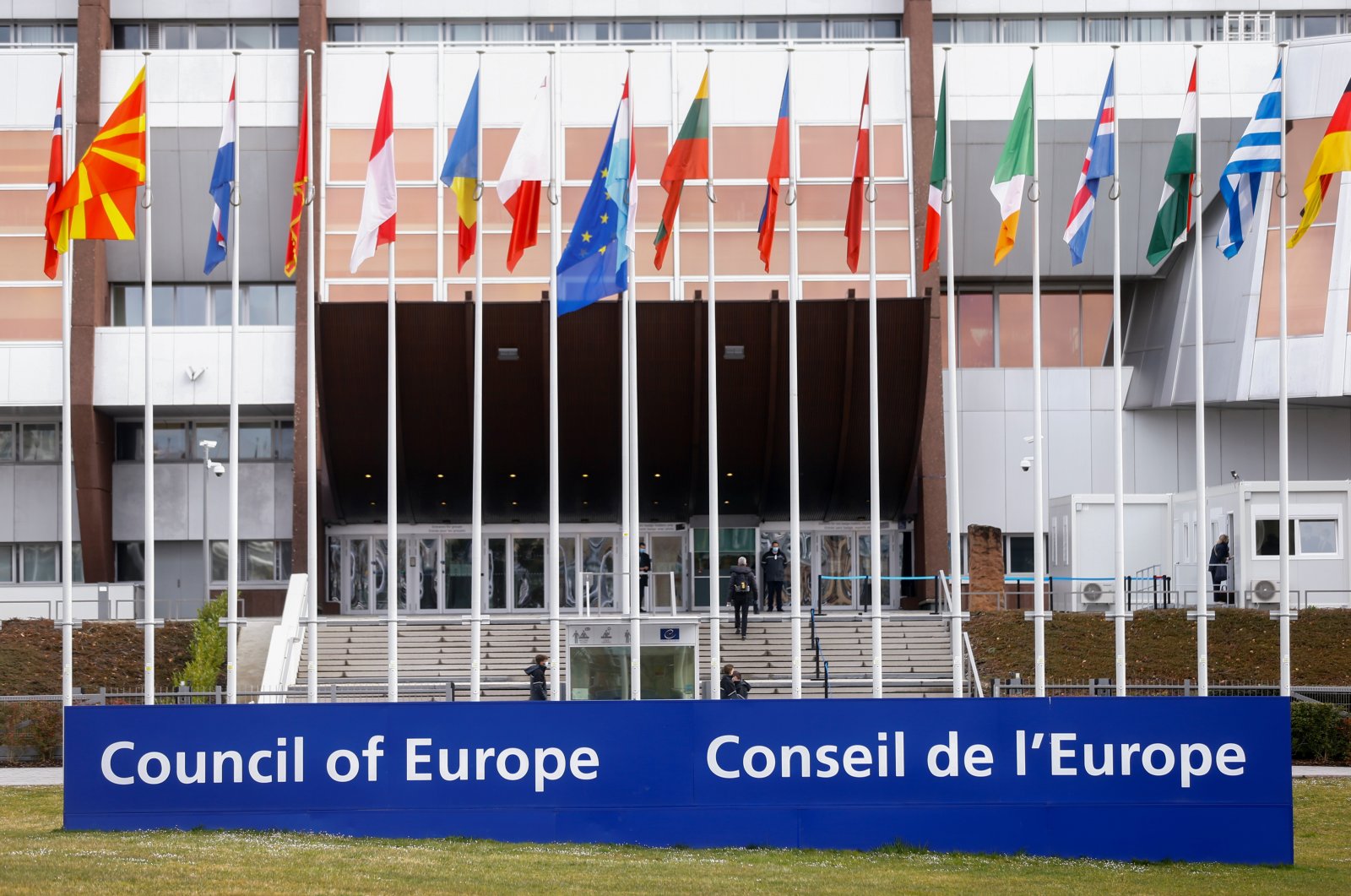 Flags wave outside the Council of Europe building on the day Ukrainian President Volodymyr Zelenskyy addresses the Parliamentary Assembly, in an extraordinary session to discuss Russia&#039;s invasion of Ukraine, via videolink in Strasbourg, France March 14, 2022. (Reuters File Photo)