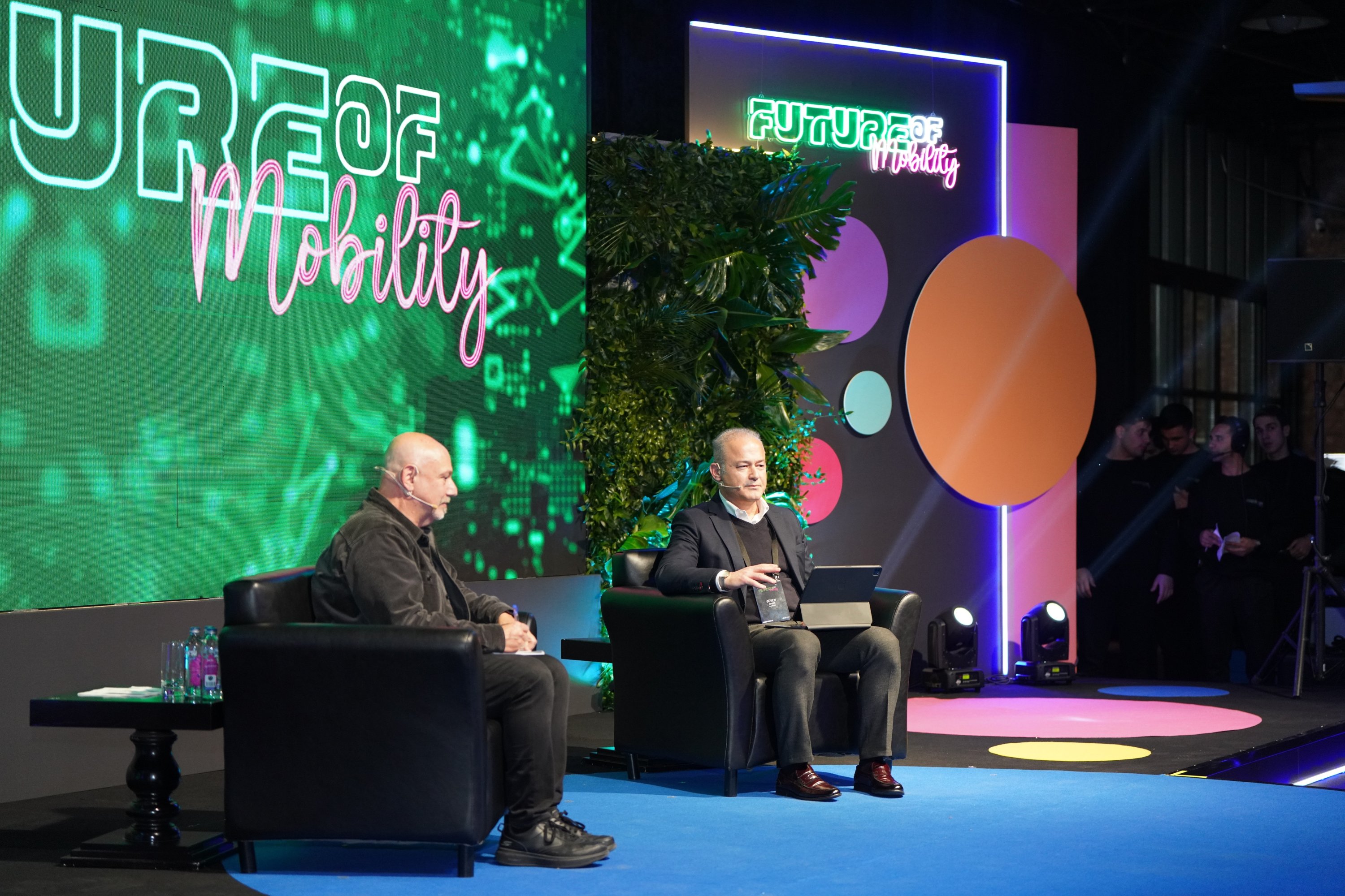 Ford Otosan leader Güven Özyurt (R) speaks during the “Future of Mobility” event in Istanbul, Türkiye, Jan. 22, 2024. (Courtesy of Ford Otosan)