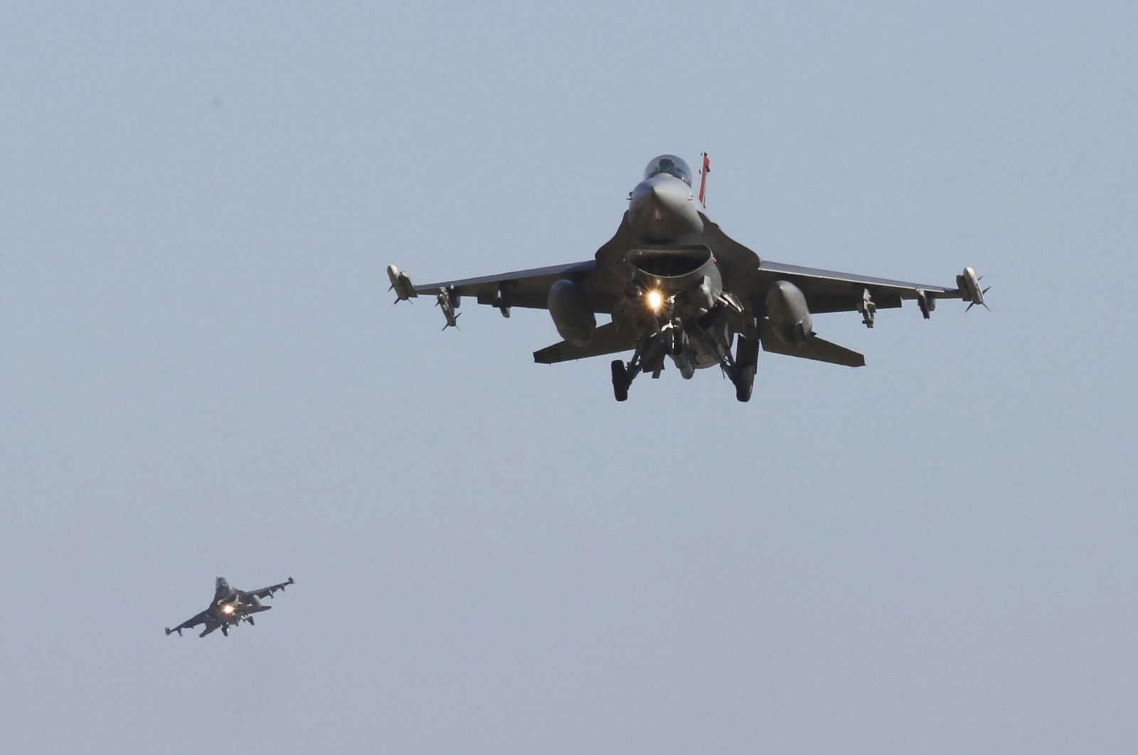 U.S. Air Force F-16 fighter jets fly over the Osan U.S. Air Base during a combined air force exercise with the United States and South Korea in Pyeongtaek, South Korea, Dec. 4, 2017. (AP Photo)