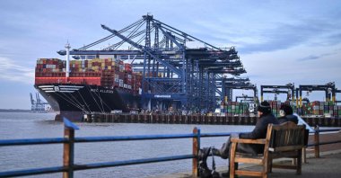 Stacks of containers are pictured on the deck of the MSC Allegra container ship, docked beside container cranes at the U.K.&#039;s largest freight port, in Felixstowe on the East coast of England, U.K., Jan. 27, 2024. (AFP Photo)