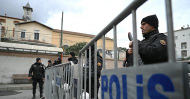 Turkish anti-riot police officers block the street of the Roman Catholic Church of Santa Maria Draperis after an attack left one dead, Istanbul, Türkiye, Jan. 28, 2024. (AFP Photo)