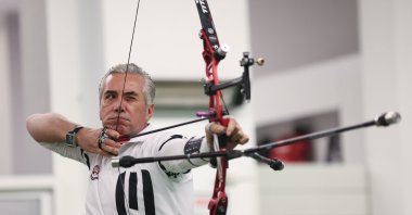 Turkish archer Vedat Erbay in action during the Indoor Archery World Cup, Nimes, France, Jan. 23, 2024. (AA Photo)
