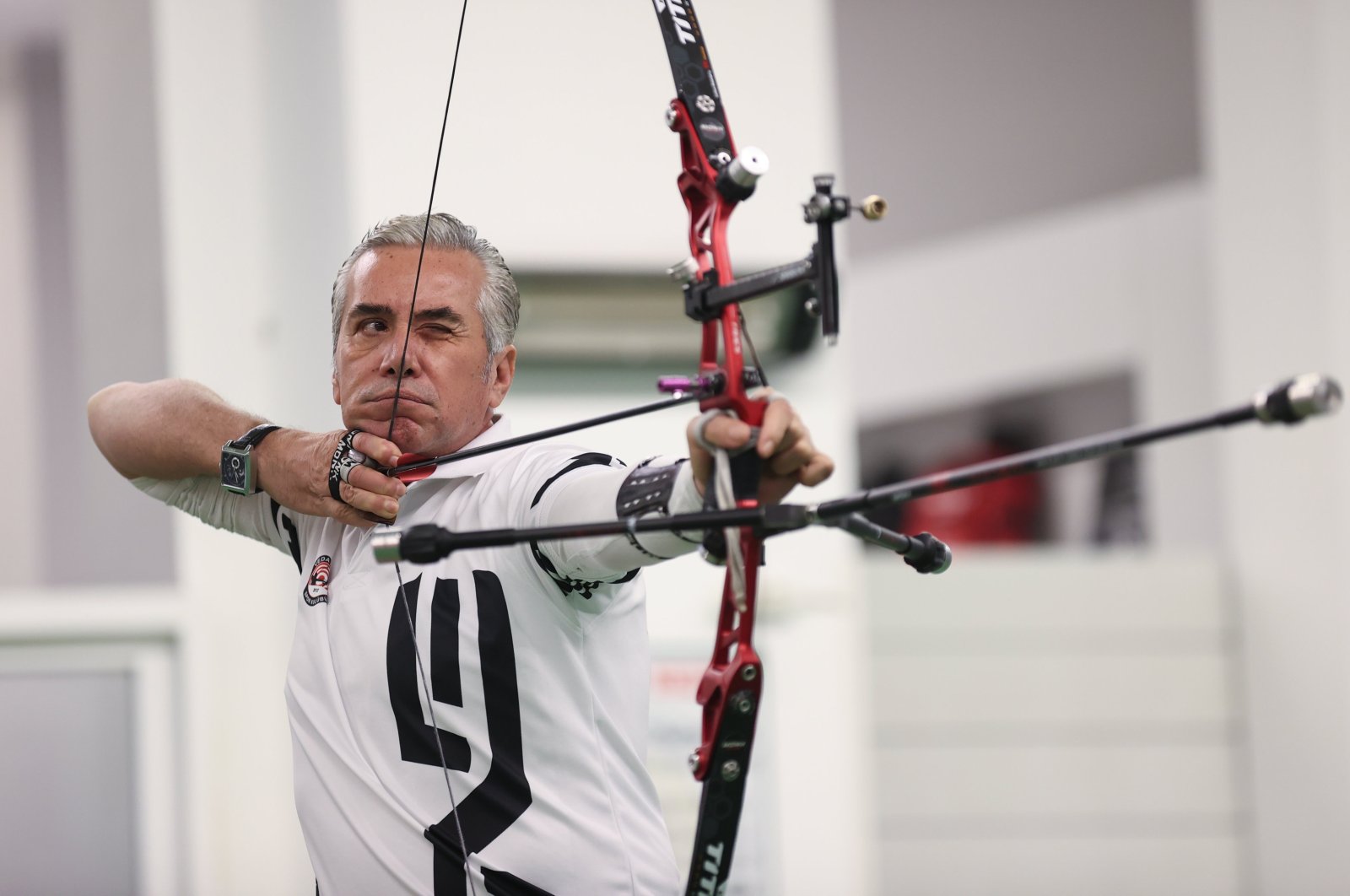 Turkish archer Vedat Erbay in action during the Indoor Archery World Cup, Nimes, France, Jan. 23, 2024. (AA Photo)