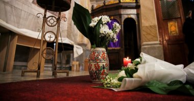 Flowers are placed inside the Italian Santa Maria Catholic Church a day after an attack during the Sunday service, in which one person was killed, Istanbul, Türkiye, Jan. 9, 2024. (Reuters Photo)
