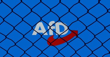 An AfD logo is behind wire mesh in Borkwalde, Brandenburg, Jan. 29, 2024. (Reuters Photo)