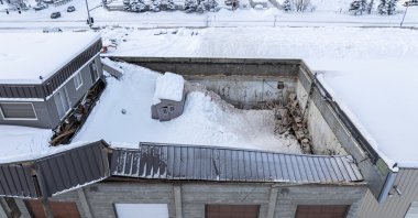 The roof of a building is partially collapsed by snow in Anchorage, Alaska, U.S., Jan. 30, 2024 (AP Photos)