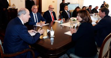 President of the Turkish Republic of North Cyprus (TRNC), Ersin Tatar (L), speaks in a meeting with the new United Nations Cyprus envoy Maria Angela Holguin Cuellar (R) in the capital Lefkoşa (Nicosia), TRNC, Jan. 30, 2024. (AFP Photo)