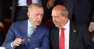 Turkish President Recep Tayyip Erdoğan (L) and Turkish Cypriot President Ersin Tatar attend a military parade commemorating Türkiye&#039;s 1974 Cyprus Peace Operation, Lefkoşa (Nicosia), Turkish Republic of Northern Cyprus (TRNC), July 20, 2023. (AFP Photo)