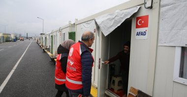 The Family and Social Services teams visit earthquake victims in their homes in the container city, 
Diyarbakır, Türkiye, Jan. 31, 2024. (AA Photo)