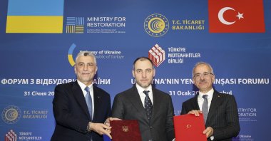 Trade Minister Ömer Bolat, Ukraine&#039;s Infrastructure Minister Oleksandr Kubrakov and Transport and Infrastructure Minister Abdulkadir Uraloğlu pose for a photo at a forum in Istanbul, Jan. 31, 2024. (AA Photo)