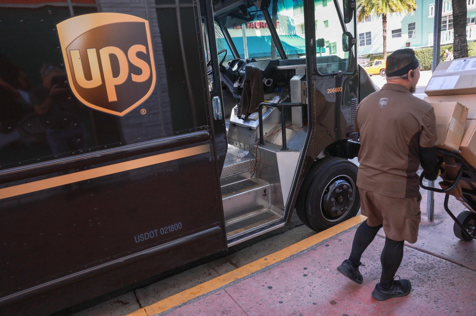 A UPS driver makes a delivery in Miami Beach, Florida, U.S., Jan. 30, 2024. (AFP Photo)