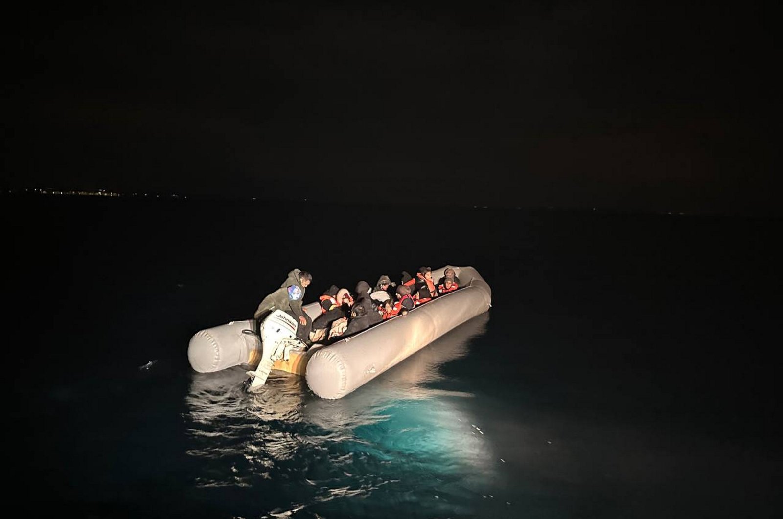 Turkish Coast Guard Command officials rescue 63 irregular migrants off western Izmir province, Türkiye, Jan. 29, 2024. (AA Photo)